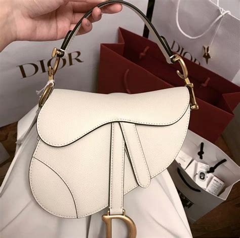 replica dior revolution necklace|dior saddle bag dupe.